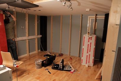 Fitting the hardwood floor and acoustic treatment in the control room