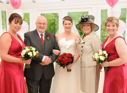 Bride bridesmaids and parents