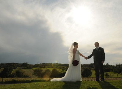 Bride and groom sunlight