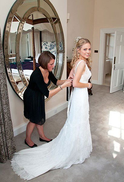 Bride getting dressed