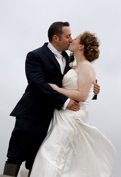 Bride and groom kissing