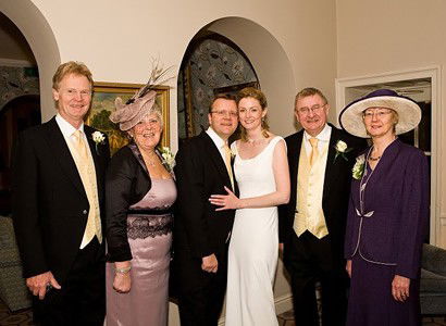 Bride and groom with parents
