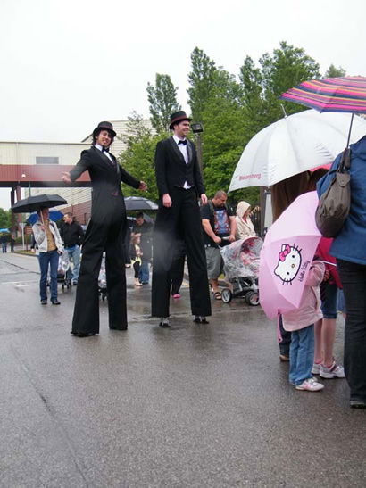 Stilt walkers performing