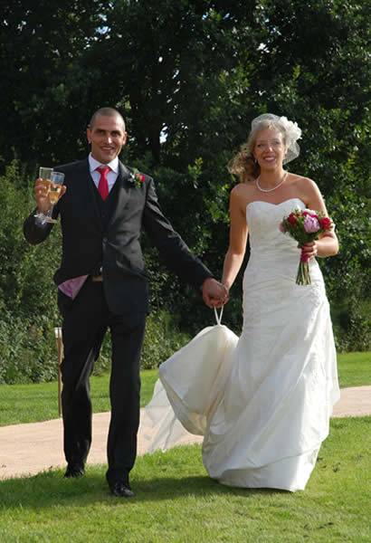 Bride and groom champagne