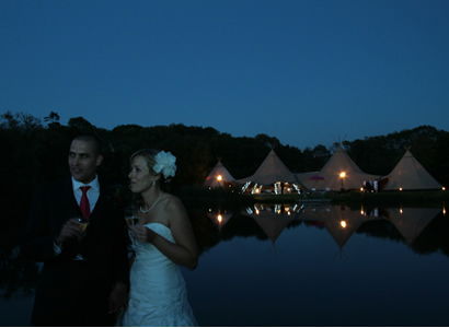 Bride and groom lake dusk