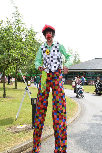 Clown on stilts