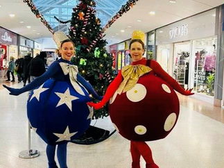 Promo Living Christmas Baubles Christmas Entertainer London