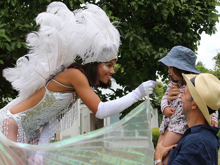 artists similar to Showgirl Stilt Walkers