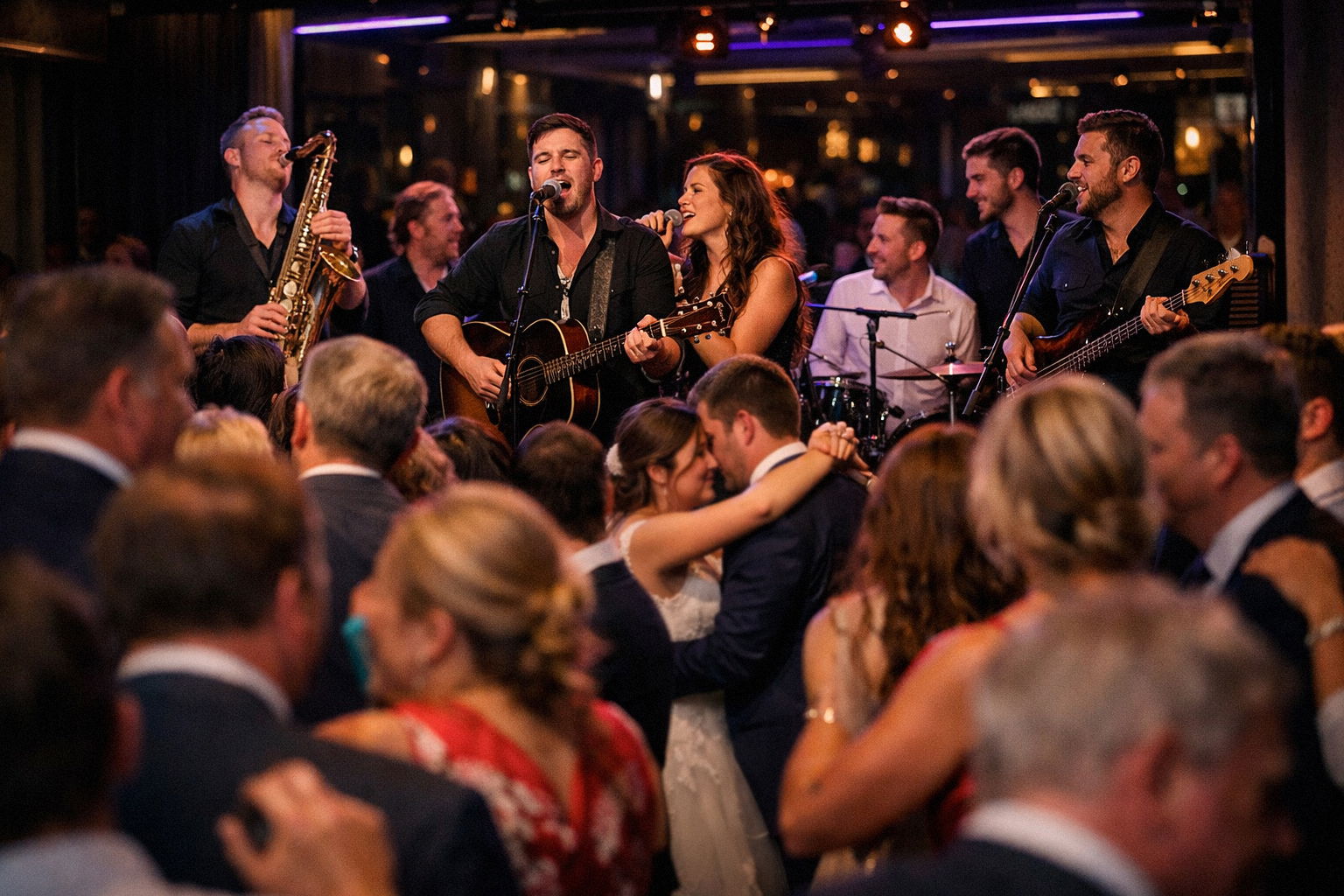 7 piece wedding band performing to a packed dancefloor
