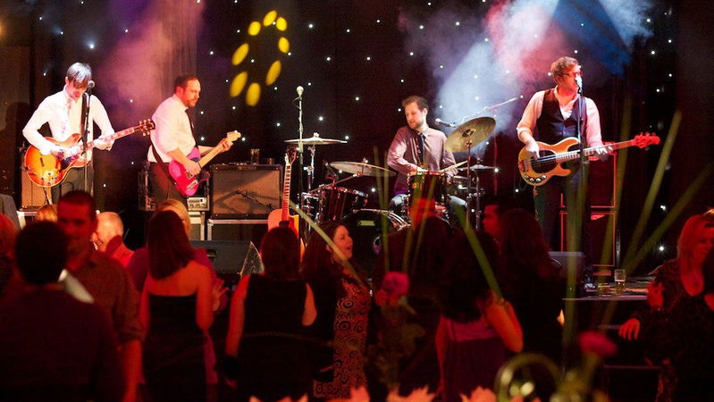 Hipster rocking out a wedding