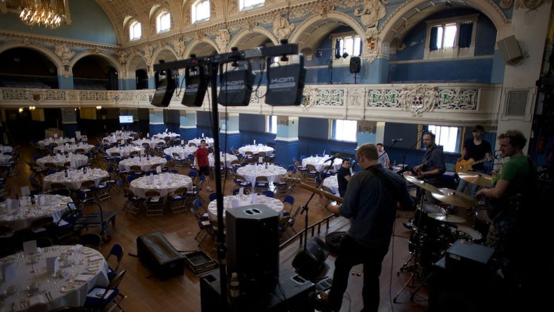 Hipster setting up at Oxford Town Hall for the OUP Gala Dinner
