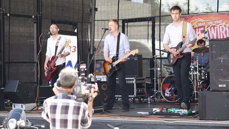 Live Wires on stage at Ocado Summer Party
